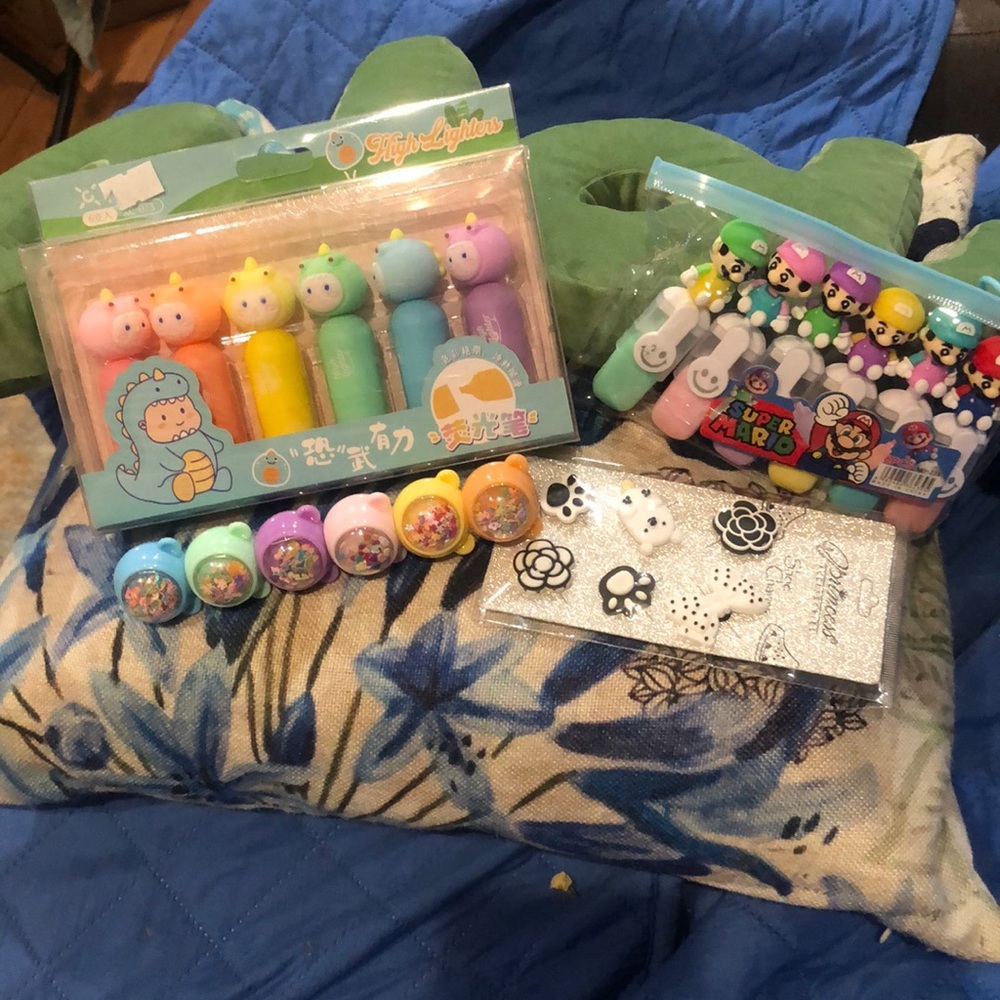 Bundle of markers and a shoe charms